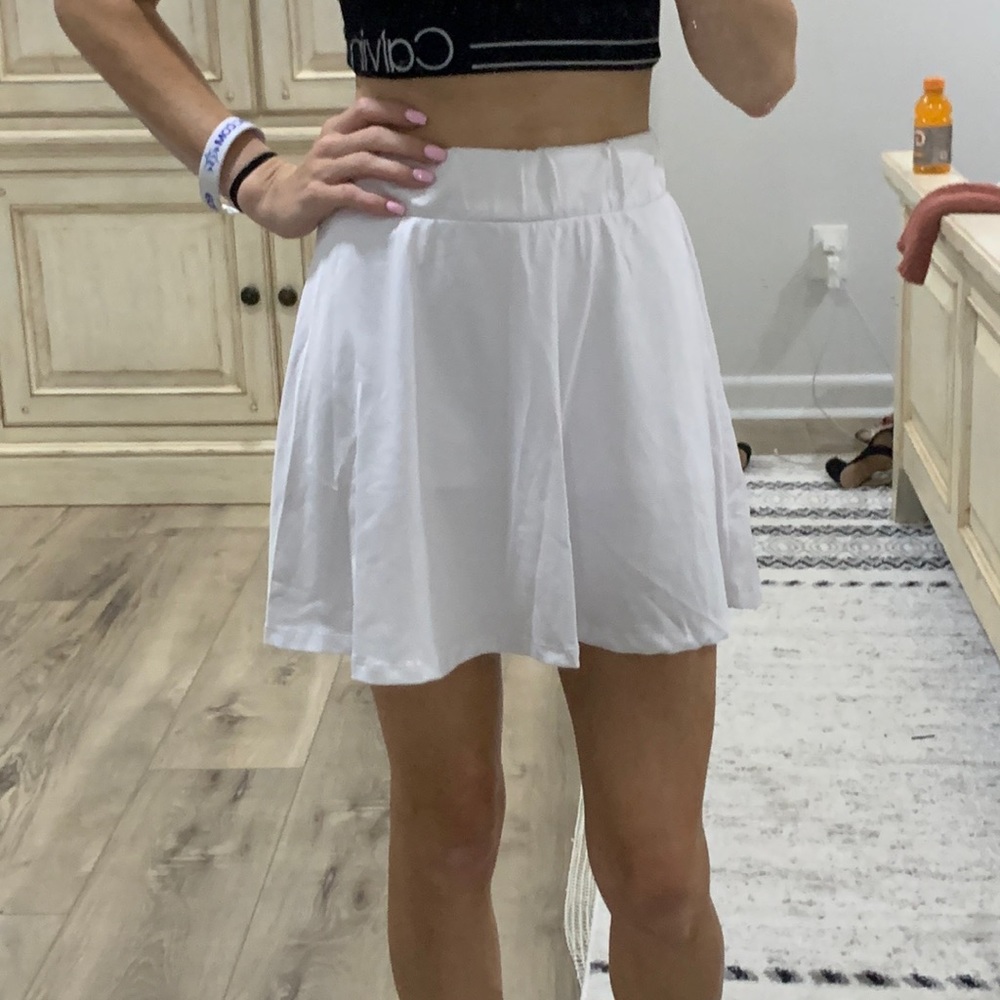 White polyester and spandex shirt